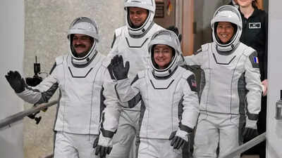 Four astronauts arrive at International Space Station via SpaceX to bring crew back to full strength