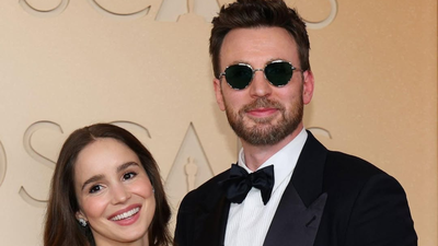 Chris Evans and Alba Baptista charm fans with a rare red carpet appearance at the 2026 Oscars after welcoming their daughter