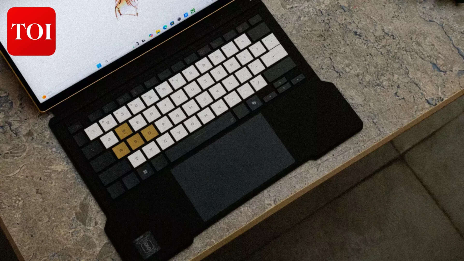 Gold on WASD, white across the board, dark on the edges. Cohesive without trying too hard.