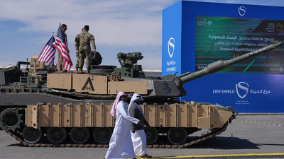 US soldiers stand atop a military tank displayed at the World Defense Show in Riyadh. (AP photo) Middle East tensions to escalate? Saudi, UAE take steps to join US-Israel vs Iran war- Report